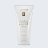 Eminence Organics Stone Crop Contouring Body Cream on light blue background